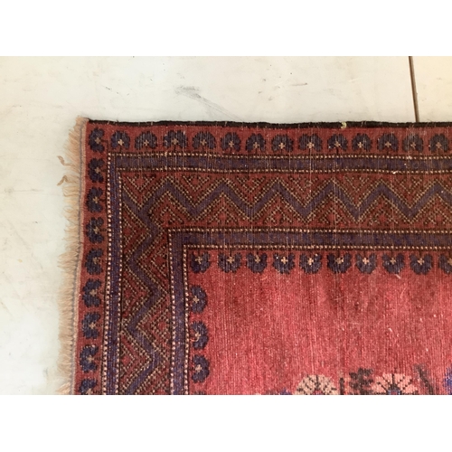 141 - Two Persian red ground rugs, larger 148 x 102cm