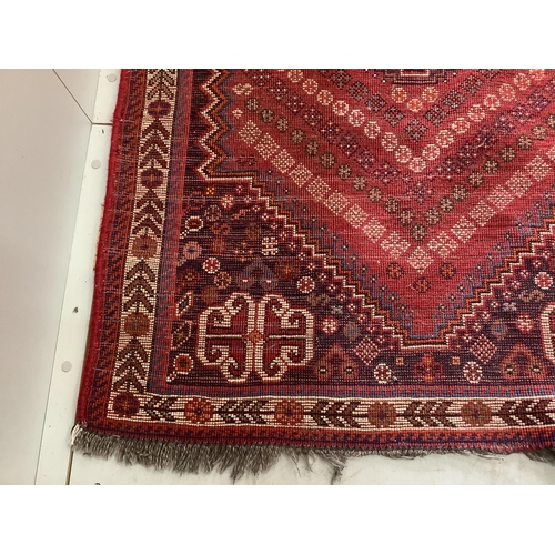 141 - Two Persian red ground rugs, larger 148 x 102cm