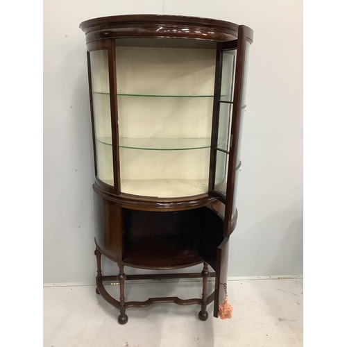 150 - An Edwardian mahogany bow fronted glazed china display cabinet, with cupboard under, width 97cm, dep... 