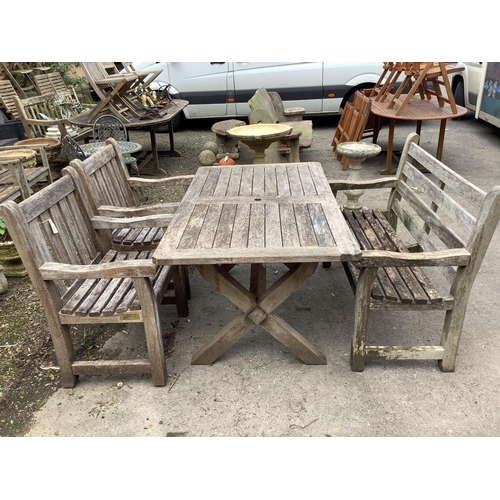 17 - A rectangular weathered teak garden table, width 152cm, depth 86cm, height 74cm, together with a tea... 