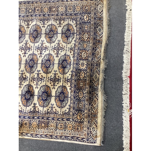 175 - A Bokhara rug and a small Chinese rug, larger 180 x 132cm