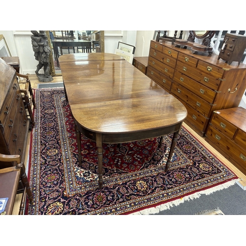 182 - A Regency mahogany D end extending dining table, 257cm extended, width 109cm, height 70cm