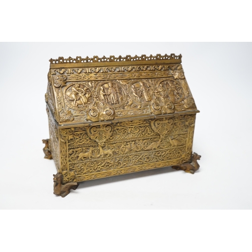 253 - A late 19th century French Gothic revival embossed brass casket, 23cm