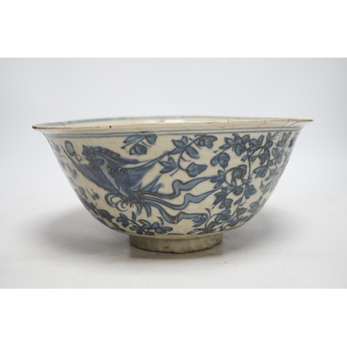 263 - A Chinese Swatow blue and white basin, 16th / 17th century, 28cm diameter