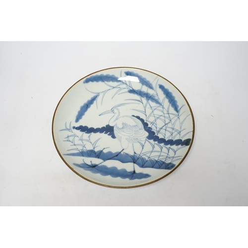 271 - A Japanese Arita blue and white 'egret or heron' dish, 18th century, 28cm