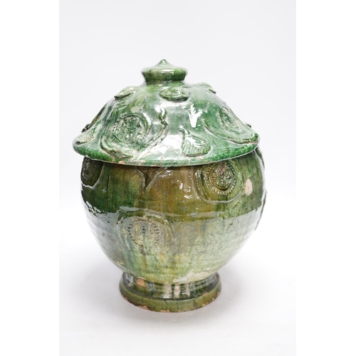 278 - A Chinese Buddhist green glazed jar and cover, Song-Yuan dynasty, 33cm