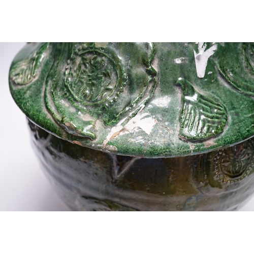 278 - A Chinese Buddhist green glazed jar and cover, Song-Yuan dynasty, 33cm