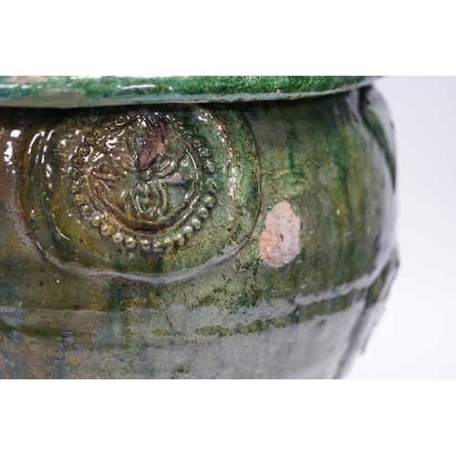 278 - A Chinese Buddhist green glazed jar and cover, Song-Yuan dynasty, 33cm