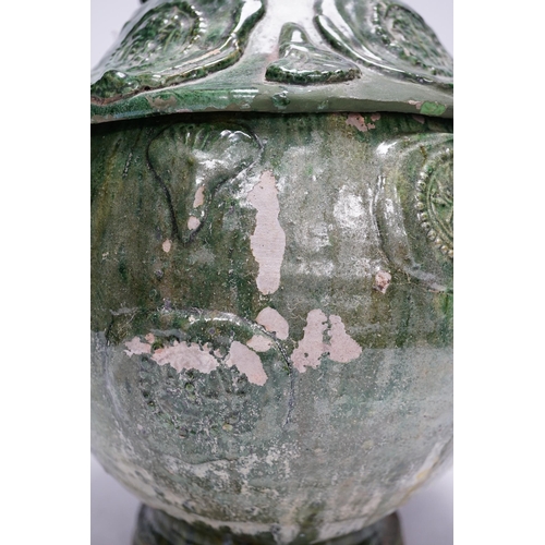 278 - A Chinese Buddhist green glazed jar and cover, Song-Yuan dynasty, 33cm