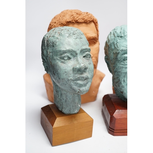 290 - Four art pottery sculpted heads on stands, two terracotta and two painted verdigris green, largest 3... 