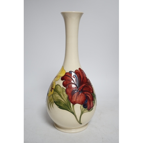 292 - A Moorcroft cream ground Hibiscus vase, 31cm high