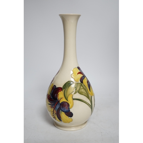 292 - A Moorcroft cream ground Hibiscus vase, 31cm high