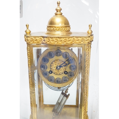 295 - A French four glass mantel clock striking on a coiled gong with gilt brass frame and mercury pendulu... 