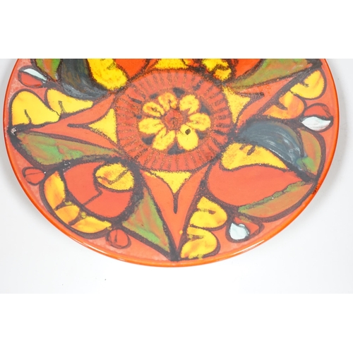 300 - A large Poole Pottery Delphis charger, 41cm diameter