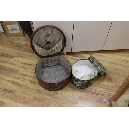 305 - A circular Harrods branded hat box and a larger gents brown leather hat box, Harrods box 36cm diamet... 