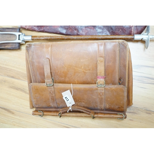 308 - A leather Gladstone bag, an attaché case and a shooting stick