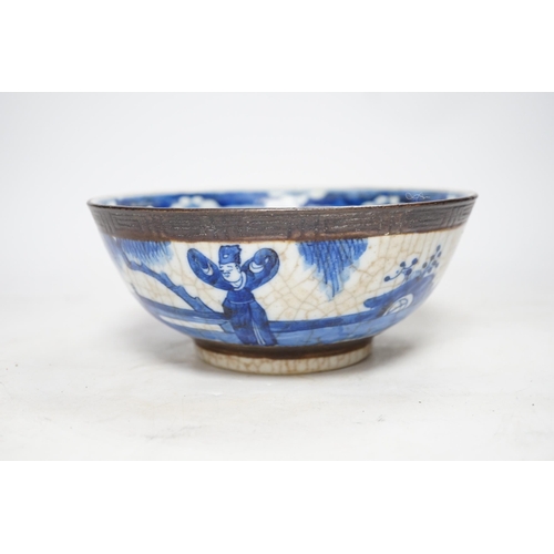 311 - A Chinese blue and white crackle glazed bowl, early 20th century, 21cm diameter