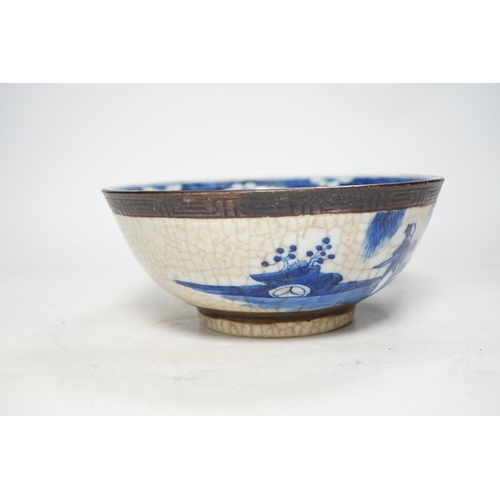 311 - A Chinese blue and white crackle glazed bowl, early 20th century, 21cm diameter