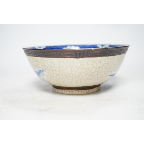 311 - A Chinese blue and white crackle glazed bowl, early 20th century, 21cm diameter