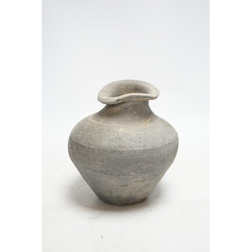 315 - A Chinese grey pottery ribbed jar, probably  Han dynasty, 19cm high