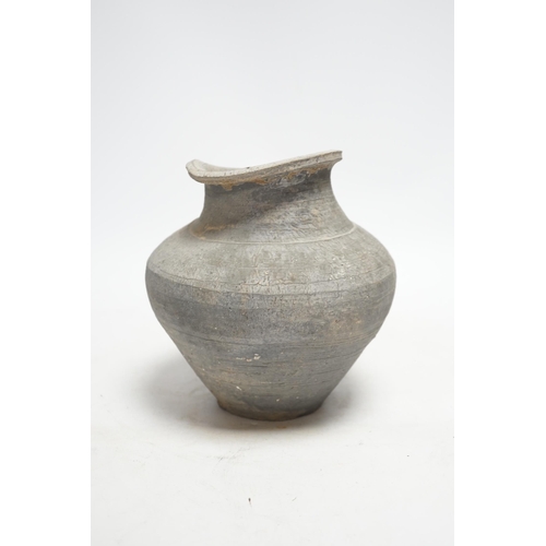 315 - A Chinese grey pottery ribbed jar, probably  Han dynasty, 19cm high