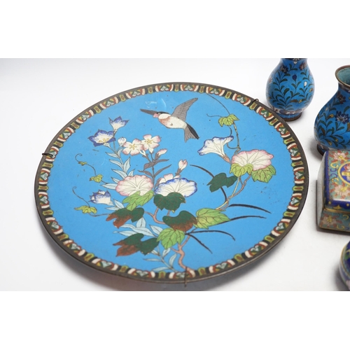 325 - Seven Chinese or Japanese cloisonné enamel items including a pair of candlesticks, 15cm high, a char... 