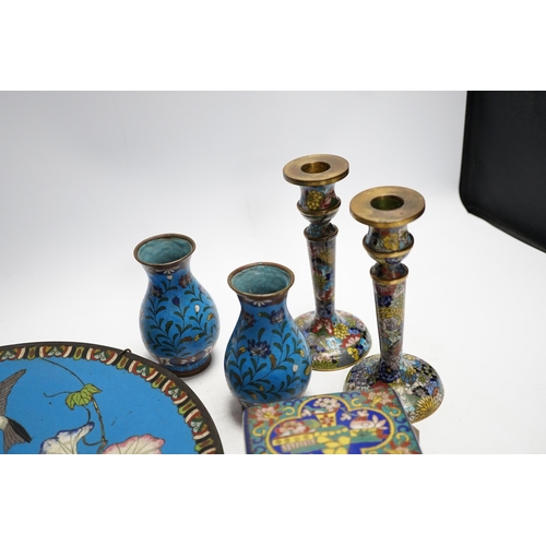 325 - Seven Chinese or Japanese cloisonné enamel items including a pair of candlesticks, 15cm high, a char... 