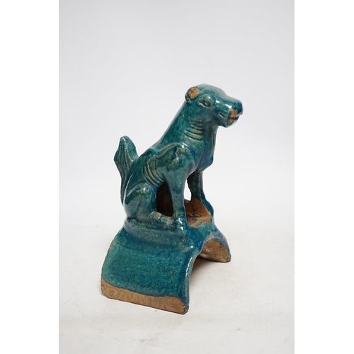 328 - A Chinese turquoise glazed lion-dog ridge tile, Ming dynasty, 22cm high