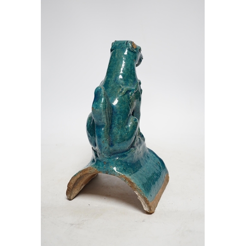 328 - A Chinese turquoise glazed lion-dog ridge tile, Ming dynasty, 22cm high