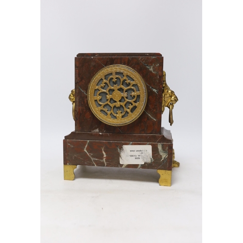 339 - A late 19th century French rouge marble and ormolu clock garniture, 31cm