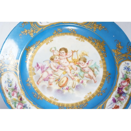 340 - A Sevres style dish decorated with amorini, 33cm