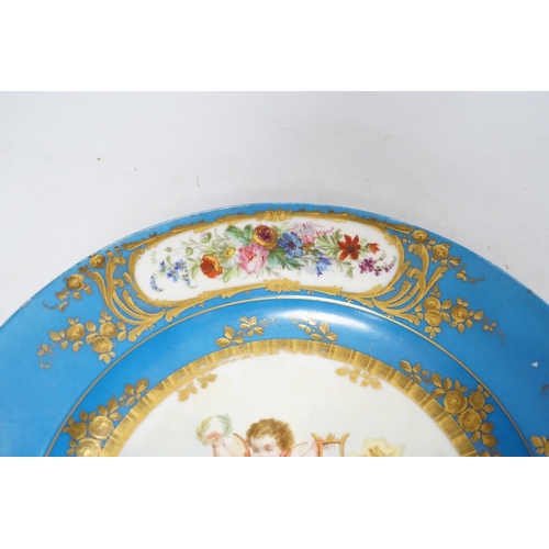 340 - A Sevres style dish decorated with amorini, 33cm