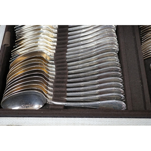 352 - A cased canteen of French Christofle silver plated bow pattern cutlery, a twelve piece setting conta... 