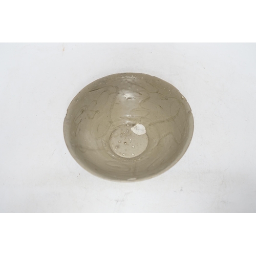 372 - A Chinese carved shipwreck bowl, Song dynasty, 17cm diameter