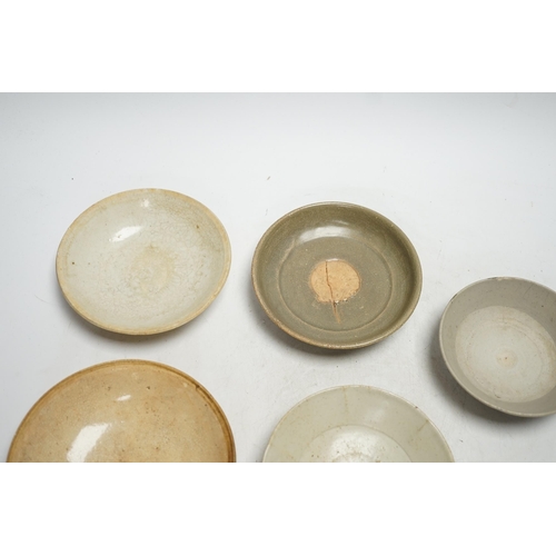 377 - A group of seven Chinese Ding type, qingbai and celadon dishes, Song-Yuan dynasty, largest 15.5cm... 