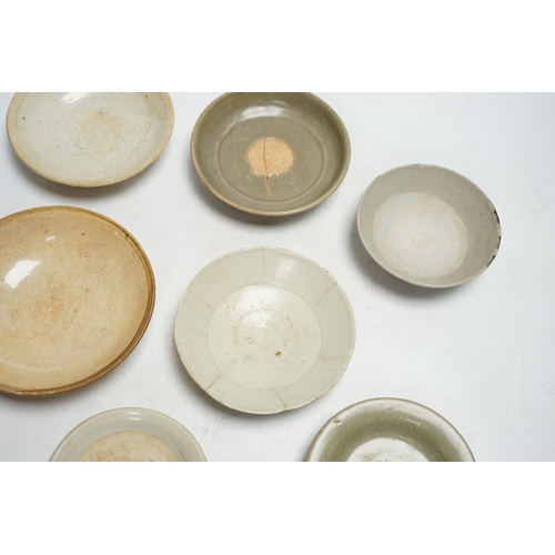 377 - A group of seven Chinese Ding type, qingbai and celadon dishes, Song-Yuan dynasty, largest 15.5cm... 