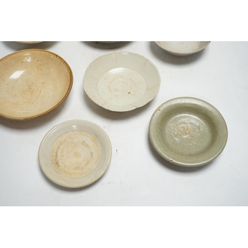 377 - A group of seven Chinese Ding type, qingbai and celadon dishes, Song-Yuan dynasty, largest 15.5cm... 