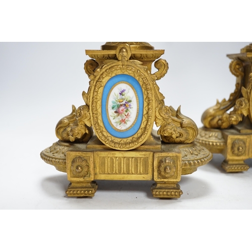 391 - A pair of 19th century French ornamental gilt metal candlesticks, possibly clock garnitures, 32.5cm ... 