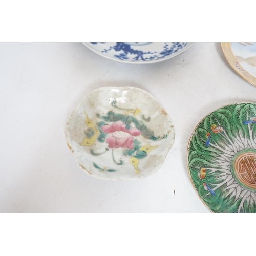 392 - Four Chinese or Japanese porcelain saucers, largest 16.5 cm diameter