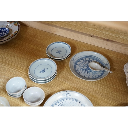 395 - A group of Chinese Tek Sing cargo wares, including blue and white or enamelled plates, bowls, spoons... 