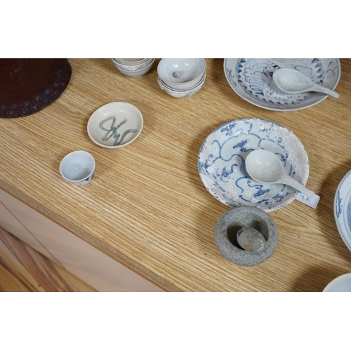 395 - A group of Chinese Tek Sing cargo wares, including blue and white or enamelled plates, bowls, spoons... 