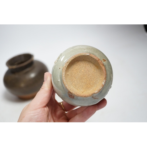 399 - A Chinese brown partially glazed jar and a celadon jar, Song Dynasty largest 13cm in diameter