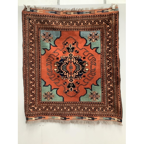 58 - Two Turkish red ground rugs, larger 156 x 130cm