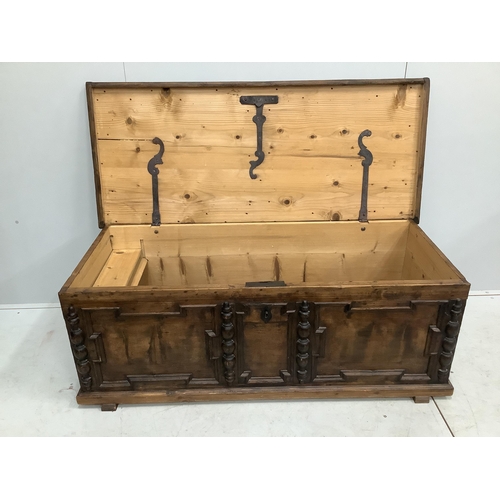 80 - An 18th century style panelled pine coffer, width 146cm, depth 63cm, height 54cm