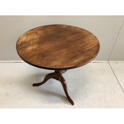 1023 - An early Victorian mahogany circular tilt top tripod tea table, diameter 80cm, height 71cm