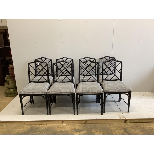 1030 - A set of eight reproduction ebonised faux bamboo dining chairs