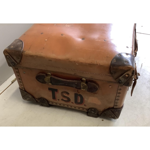 1050 - An early 20th century leather mounted travelling trunk, width 76cm, depth 52cm, height 32cm