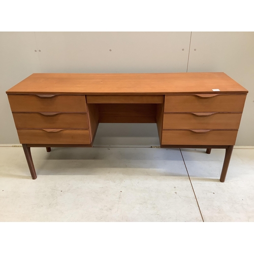 1059 - A mid century Europa teak dressing table, width 150cm, depth 45cm, height 73cm