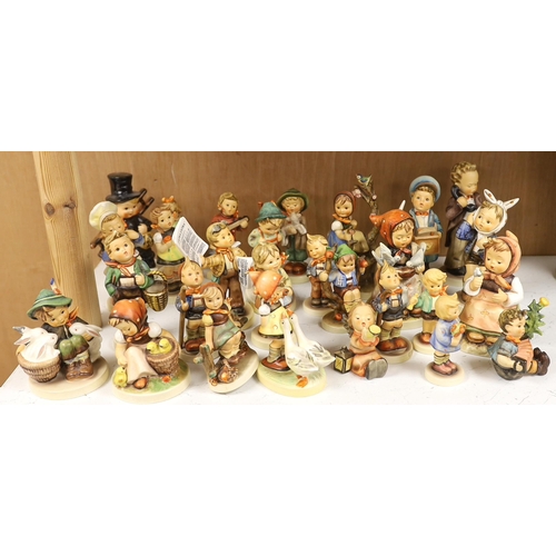 1383 - Twenty eight Goebel Hummel figures, largest 15cm high