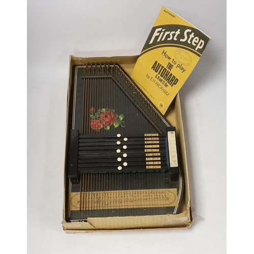 1386 - An autoharp in original box with booklet